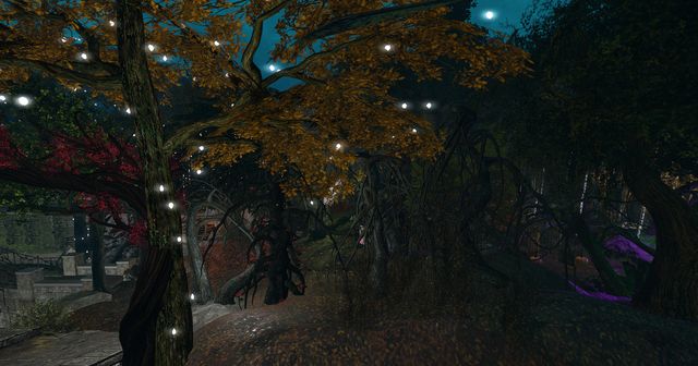 An autumn tree in the dark, full of fireflies.